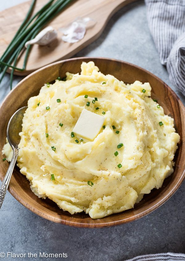 close up of yukon gold mashed potatoes with butter on top