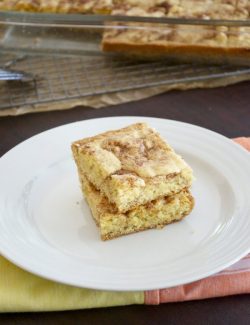 Snickerdoodle bars stacked on a plate