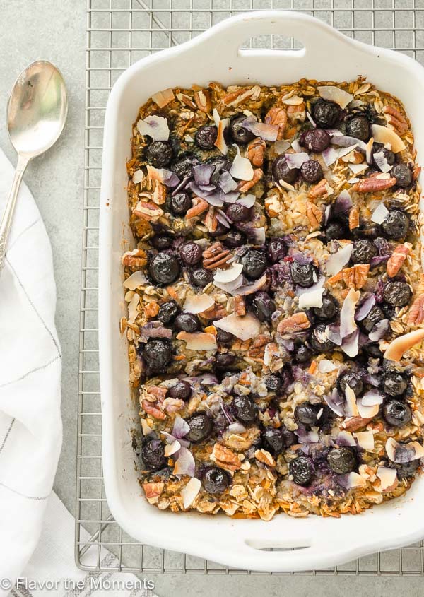 Blueberry Morning Glory Baked Oatmeal is a wholesome baked oatmeal packed with blueberries, grated carrot and apple. It's a hearty, nutritious breakfast perfect for weekdays or a special brunch! @FlavortheMoment