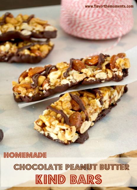Homemade KIND bars stacked on parchment paper