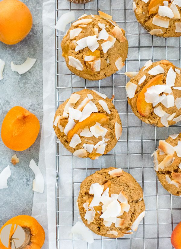 Apricot muffins with apricot and coconut on wire rack