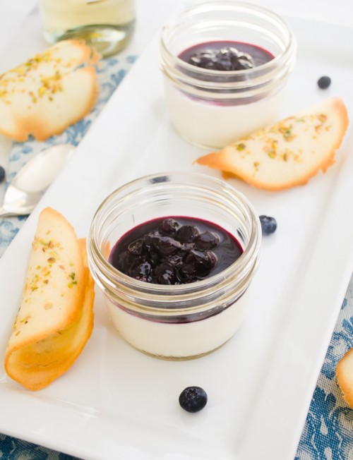 front view of blueberry panna cotta in jar