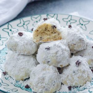 Chocolate Chip snowball cookies piled on a plate