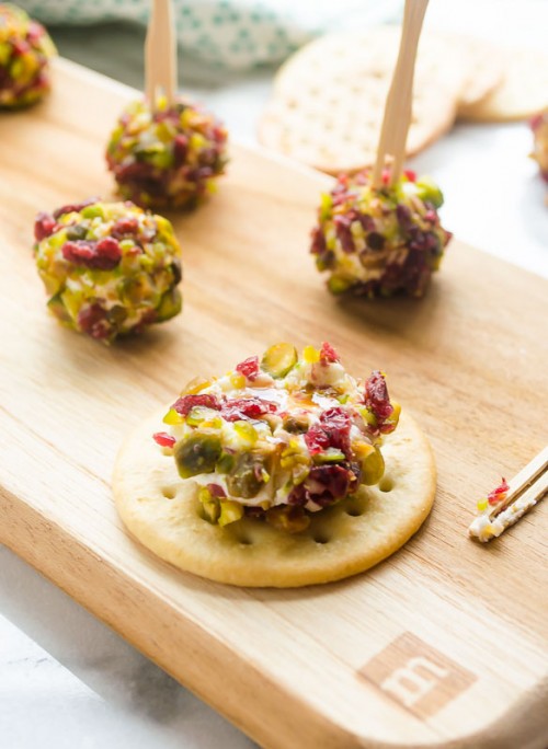 Goat cheese ball spread on a cracker