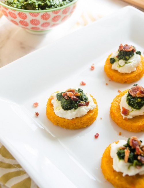 Oven baked polenta crostini with pesto and ricotta