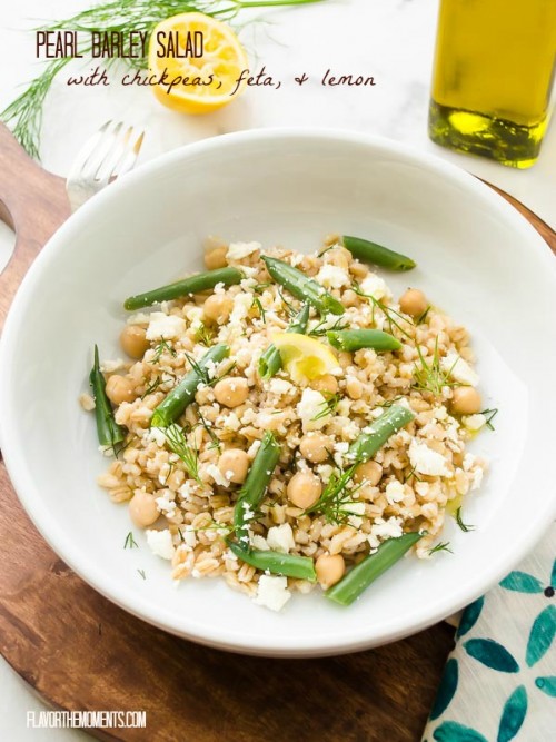 Pearl barley salad in white bowl with green beans