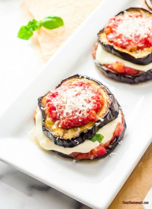Close healthy eggplant parmesan on serving plate
