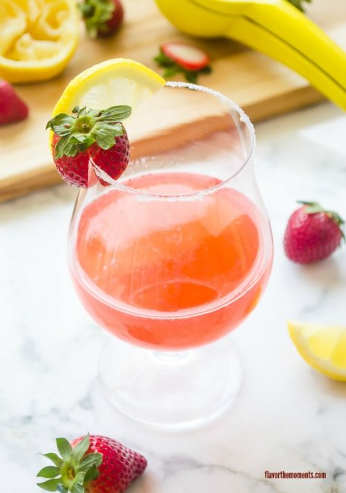 Strawberry lemon drop in glass with sugar on the rim