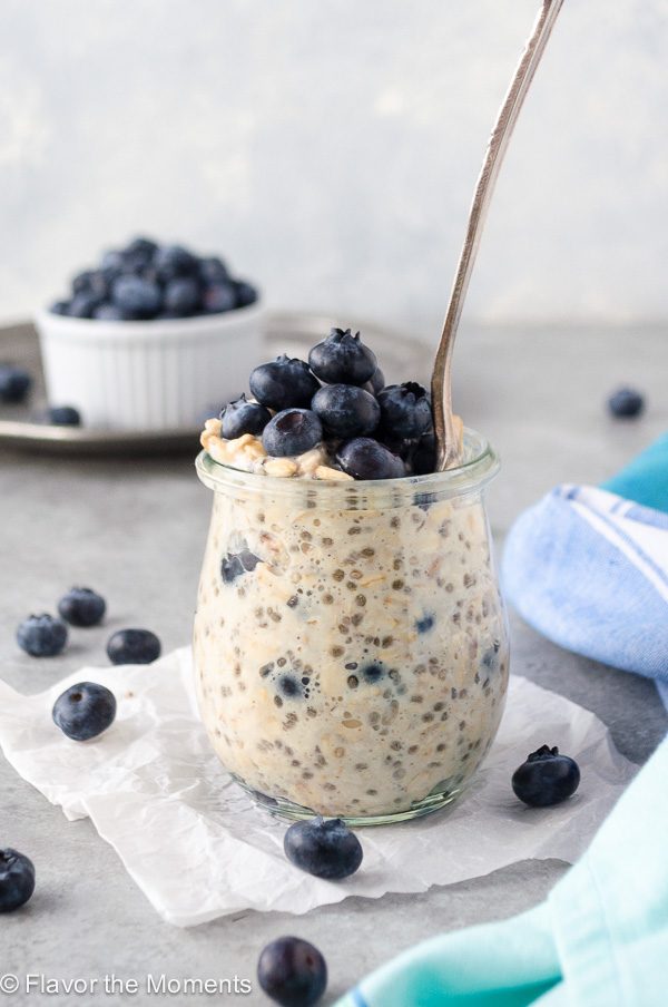front view of blueberry overnight oats with spoon