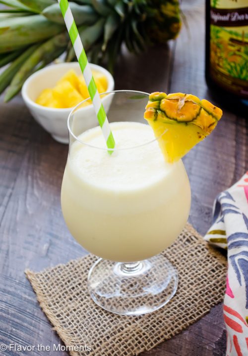Fresh pineapple pina colada in glass with pineapple