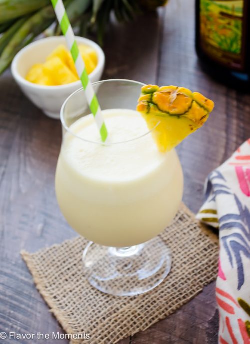 Fresh pineapple pina colada in glass with pineapple