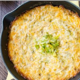 cheesy baked brussels sprout dip overhead shot in cast iron skillet