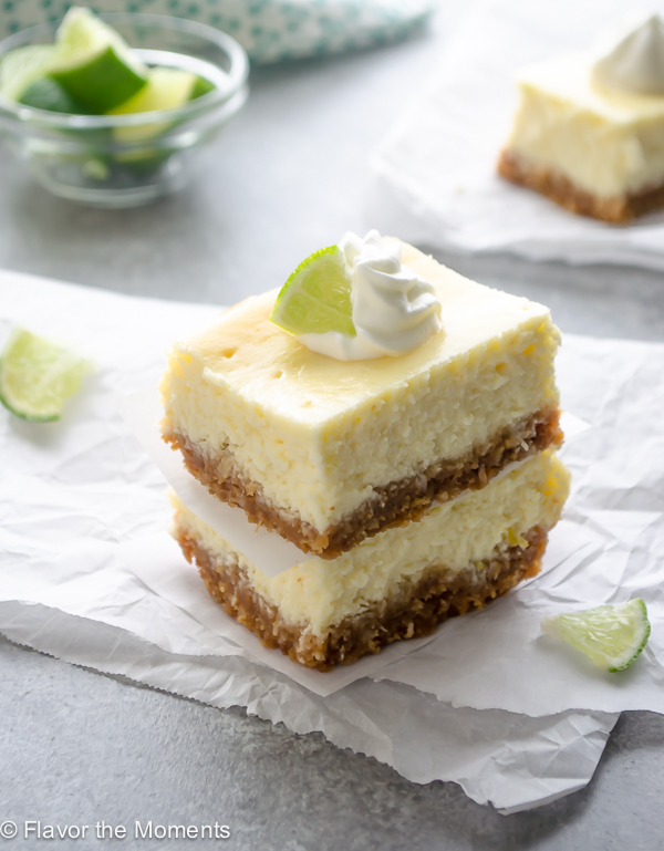 Key Lime Cheesecake Bars with Coconut Macadamia Crust are so easy to make, ultra creamy, and bursting with fresh key lime flavor! @FlavortheMoment