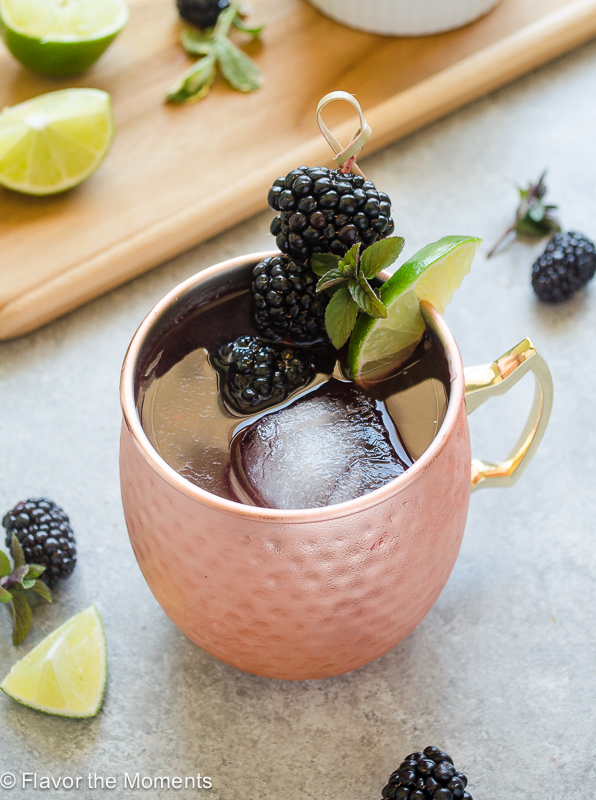 blackberry moscow mule with blackberries on a toothpick