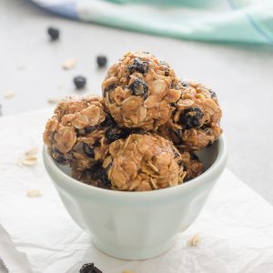 close up of almond blueberry energy bites in bowl