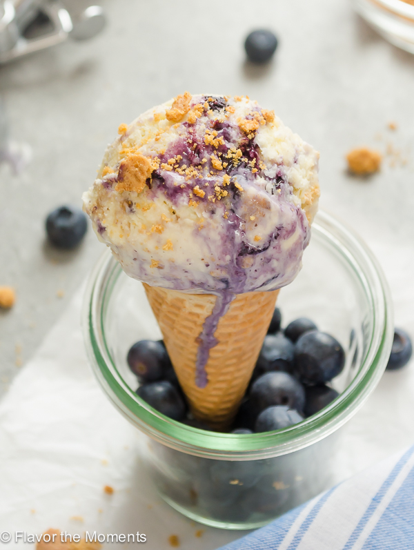 Blueberry Pie Ice Cream cone with graham cracker crumbs on top