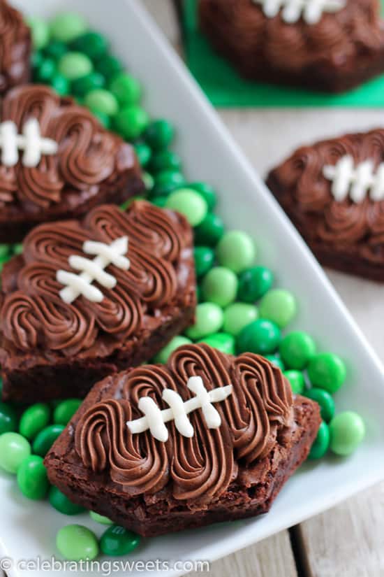 Frosted football brownies on a platter
