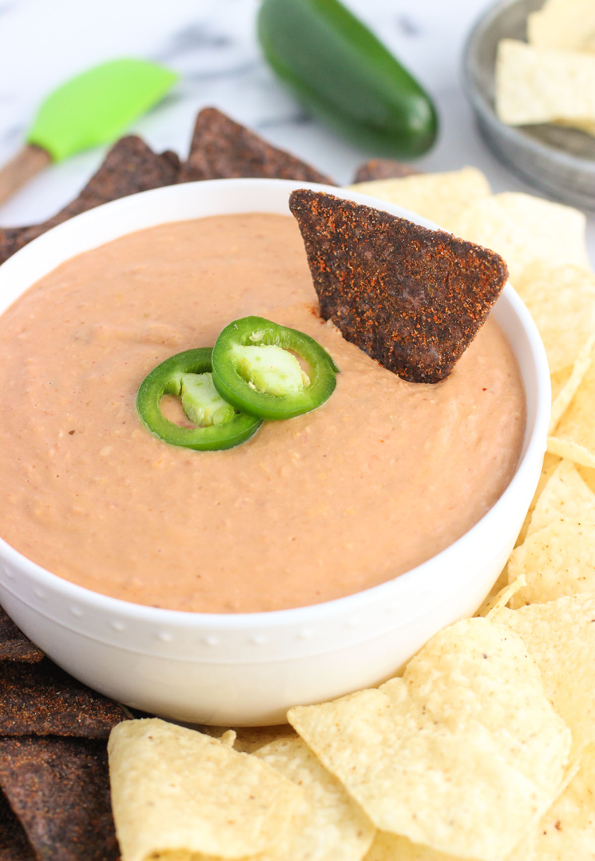 Cheesy salsa bean dip in bowl