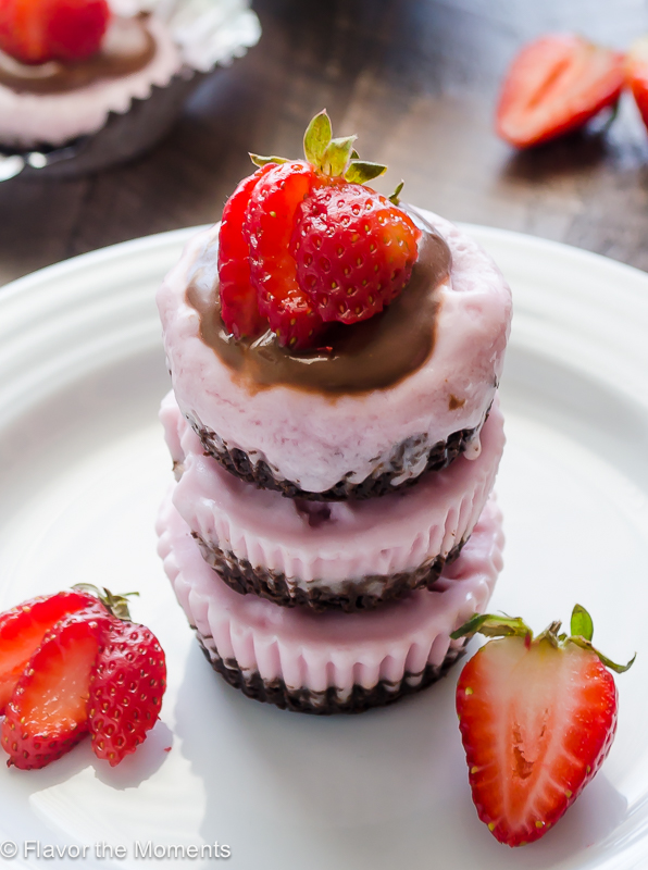 brownie ice cream cupcakes with chocolate ganache and strawberries on top