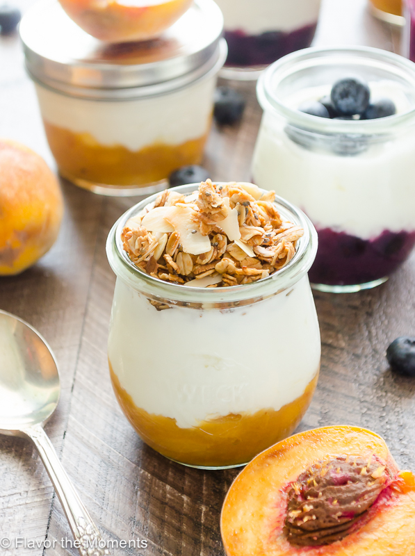 fruit on the bottom yogurt in jar with granola on top