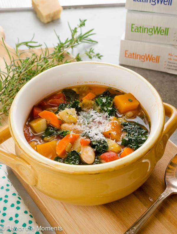 Autumn vegetable soup topped with parmesan cheese