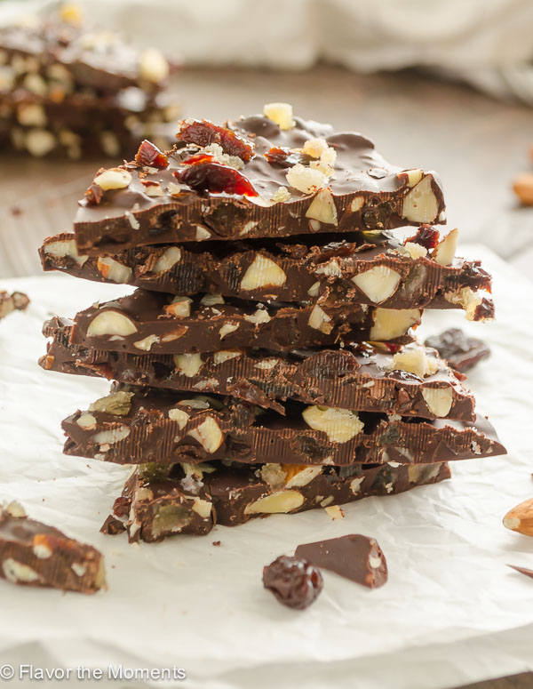 pile of chocolate bark with almonds and dried cranberries