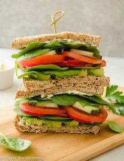 veggie sandwich on a cutting board