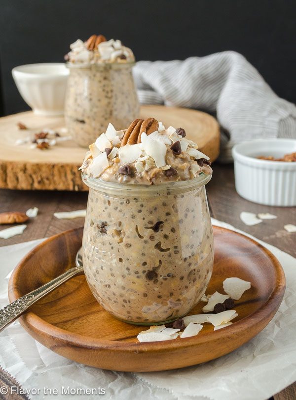 Jar of german chocolate overnight oats with pecan and coconut on top