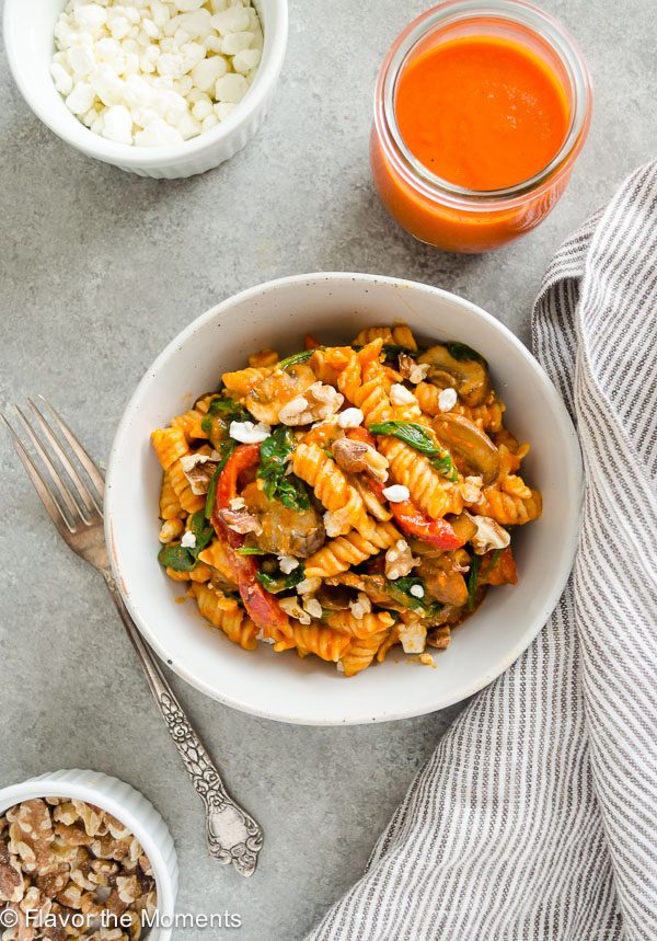 Roasted Red Pepper Pasta in a white bowl with fork