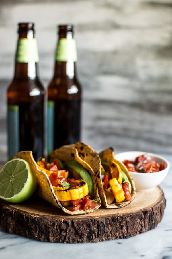 Delicata squash tacos with beer in background