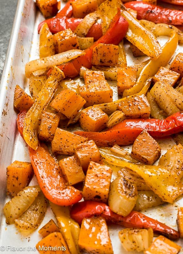 Roasted butternut squash, peppers and onions on a sheet pan