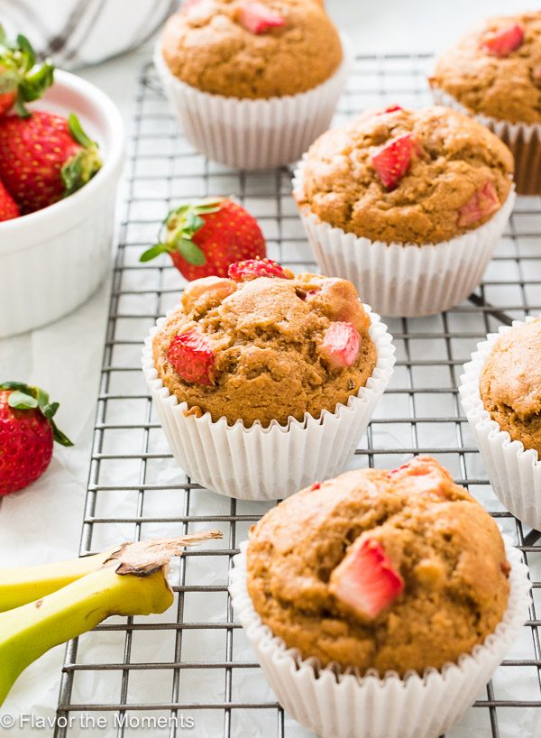 close up of healthy strawberry banana muffins on wire rack