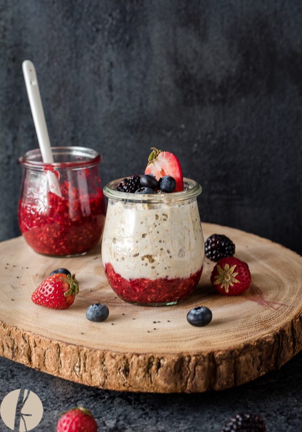 Chia jam overnight oats with jar of jam next to it