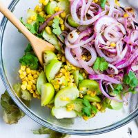 Grilled corn salad in glass bowl