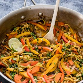Vegetarian Thai Peanut Zucchini Noodles are an easy low carb meal packed with zoodles and veggies in a delicious Thai peanut sauce!