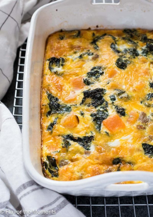 Breakfast casserole with butternut squash and kale on wire rack
