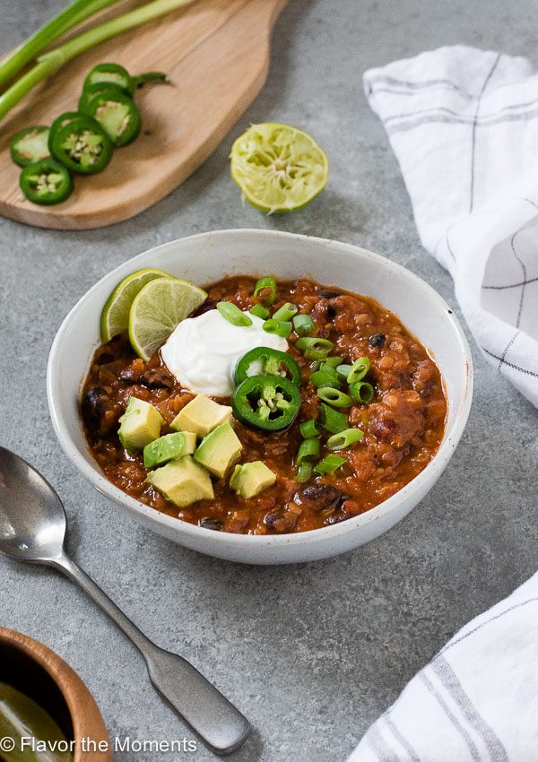front view of lentil chili with toppings