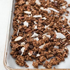 German chocolate granola on baking sheet