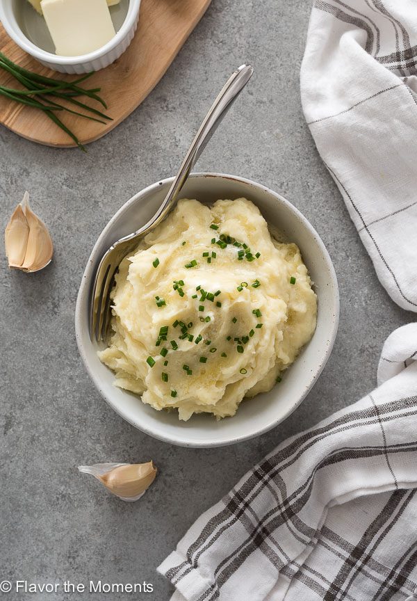 Overhead shot of instant pot mashed potatoes in bowl with fork