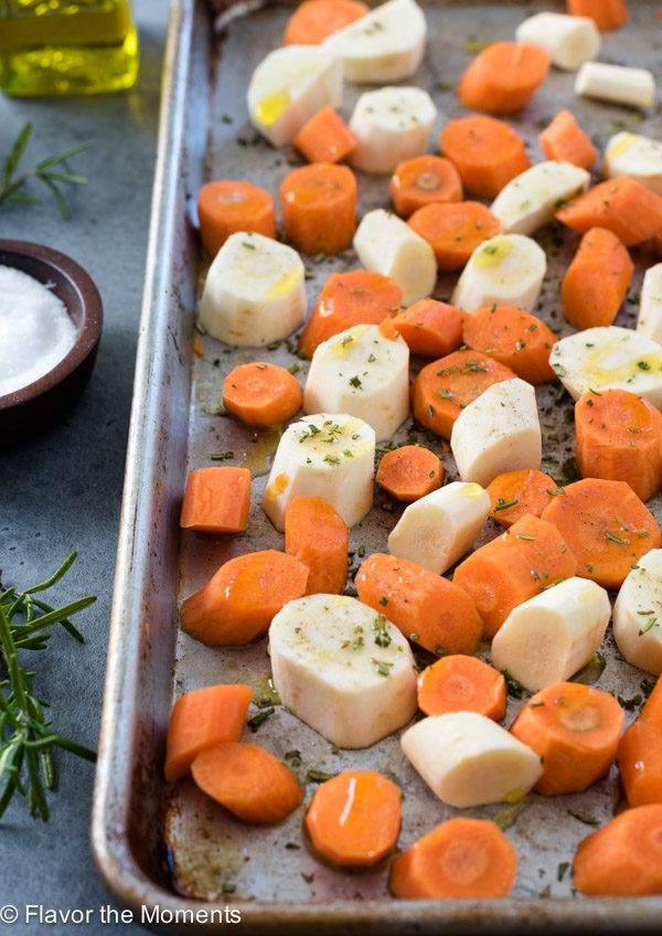 carrots and parsnips on sheet pan process shot