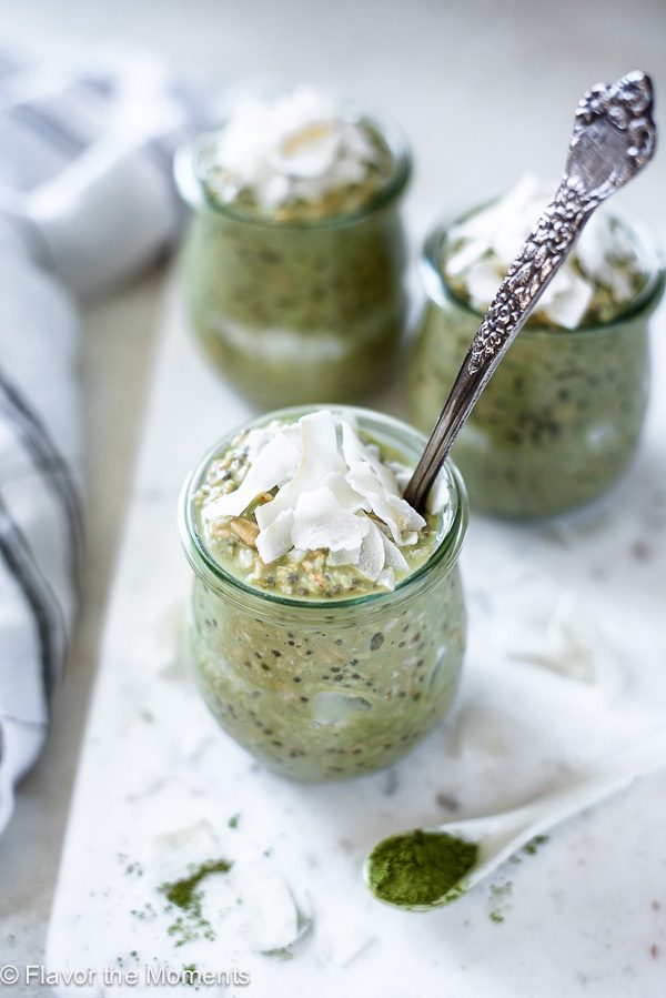 overhead shot of matcha overnight oats with coconut flakes