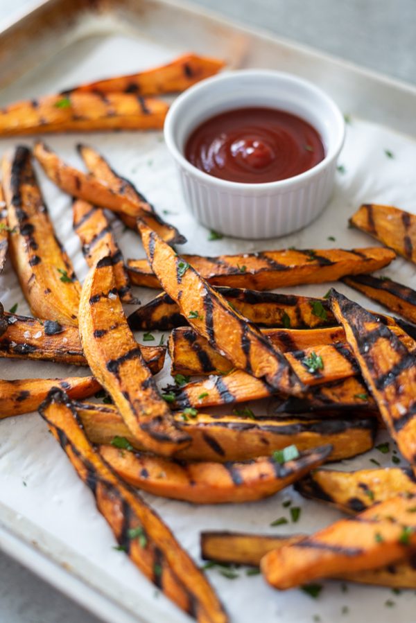 front view of grilled sweet potatoes with sriracha ketchup