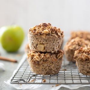 Close up of apple crisp baked oatmeal cups on a wire rack