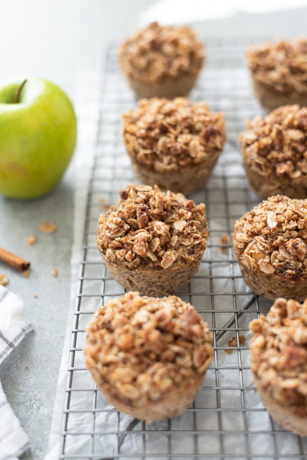 apple crisp baked oatmeal cups cooling on wire rack