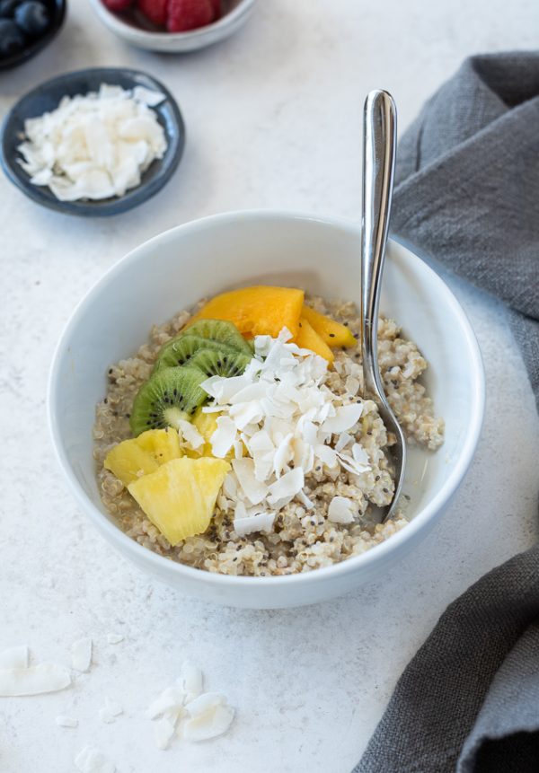 close up tropical quinoa oatmeal breakfast bowls