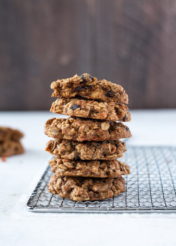 tall stack of carrot oatmeal cookies on a wire rack