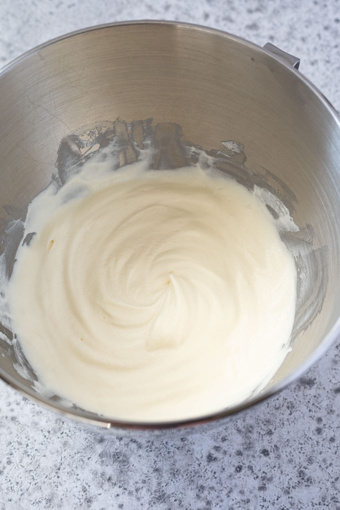 Whipped cream in a mixing bowl