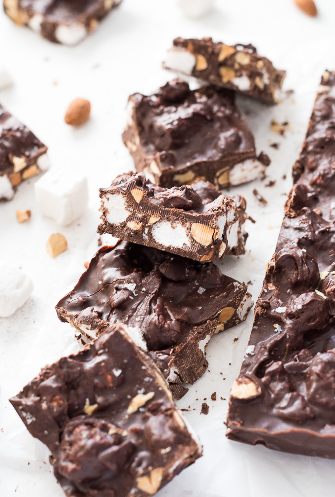 Squares of homemade rocky road on parchment paper
