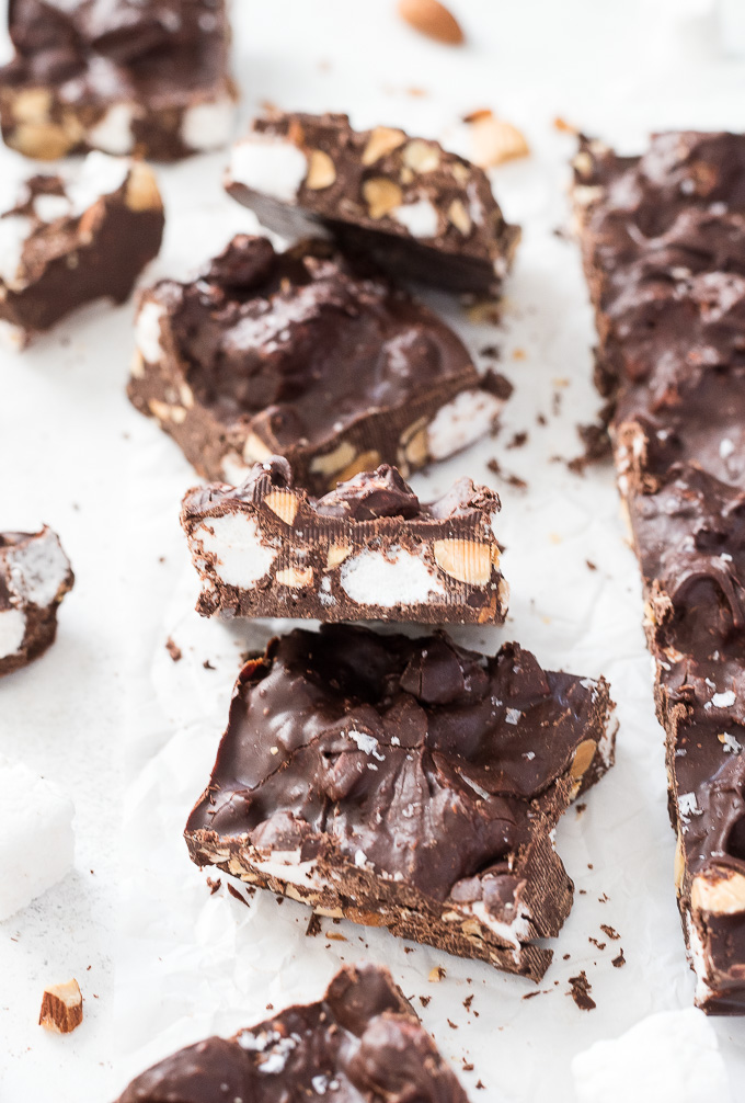 Squares of rocky road candy on parchment paper