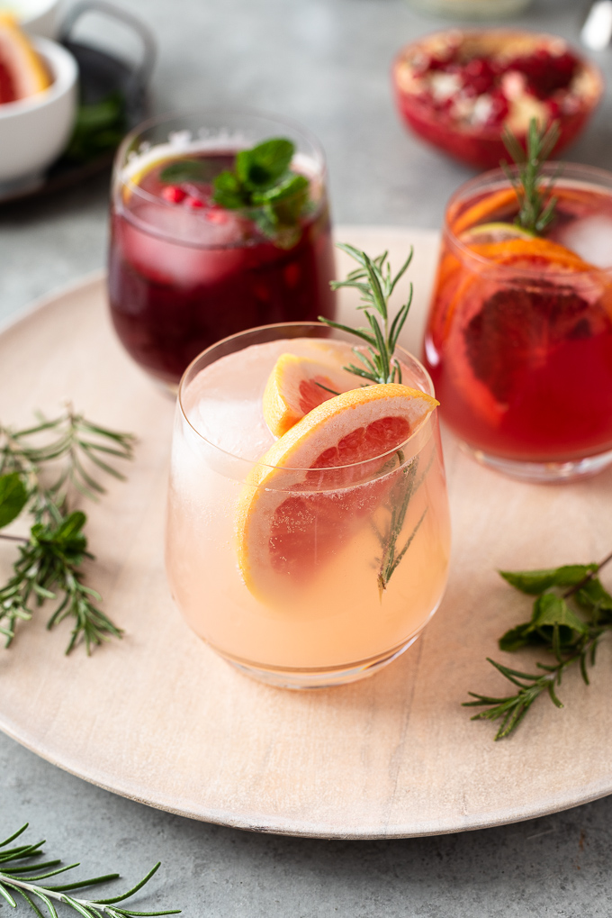 Grapefruit rosemary spritzer with rosemary sprig garnish
